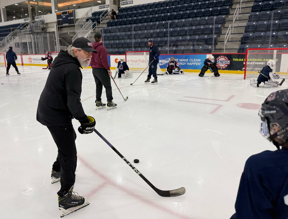 Jim Keserich lining up a shot during a goalie drill